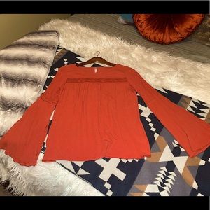 Burnt orange bell sleeve top